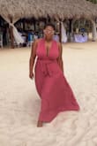 I was in awe of the dress before I got it and even more pleased when I wore it! I purchased the dress for a 95 degree wedding in Jamaica and the heavy material actually kept me a bit cooler. I even switched the way I wore the dress between the ceremony and the reception. 100% recommend! Also, I sized down and recommend that everyone do that. - Ajon C.