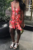 I got a medium and it fits but it doesn't show my figure as much as I would like it to. The dress kind of makes me look boxy. I really had to tighten the belt on the dress to add some figure. But I also think a small would have been too tight or short. Really like the color of the dress! - Katherine H.