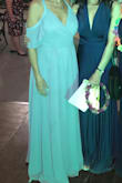 I bought the dress for my mom and she loved it.
We didn't do any alterations, it fit perfectly for both of us because it's a wrap dress which was perfect after eating a lot at the wedding since you can adjust it.
The flow of the dress was great and light. - Laura G.