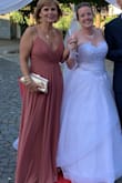 I was wearing this dress for my niece's wedding!! I felt great in it!!!! It looks beautiful!!! I ordered Medium size, it fits great it, just the length was too long so I had it tailored! But still my favorite dress!!! - Gyorgyi F.