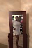 I really like the dress, the material and stretch makes this dress really comfortable. It is pretty short, about mid thigh so if you are looking for something longer in length this would not be the dress for you.  Overall, it's cute and I am really happy with this dress. - Rews C.