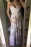 LOVE this dress! Absolutely stunning. However, I did have to hem it because it was incredibly long. Seems to be made to fit a 5'10" model with no chest, honestly. The V is very low and the small button holding it together popped open more than once when I breathed deeply. It also pushes my chest in so much that you can see exactly where it's too tight on my chest. No picture of that, but it wasn't uncomfortable or plainly noticeable enough for me to exchange it. I'm usually a size Medium but I read many reviews that said this dress runs large so I sized down. My typical dress size is a 4-6. This is the third dress I've ordered from Lulus (the only small I've ordered) that seems to have these issues. I would recommend this for someone with a smaller chest and who has no problem taking it to a seamstress to hem! - Katie H.