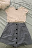 It is a little see through so I will be wearing a white bra only underneath! Also usually wear a small top but I had a suspicion the crop would be short.. and it is so order a size up ladies! - Maggie E.