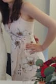 Normally I'm a small but I ordered an XS based on reviews and thank goodness I did! Nothing else was going to fit in this dress, but XS fit like a glove! Required an UnBra (chicken cutlet stick-on) to hide straps, reduce lines (and size), and give a nice silhouette.
I wore this dress to a summer wedding as a guest, Paired with gold shoes and an oatmeal colored duster. A little pricey for me, but the material and design looks far superior and luxy, compared to the backups I chose. Worth it! Excited to wear it again =) - Elizabeth T.