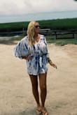 LOVE this romper! It's a little too "open" in my chest area, but 100% not an issue with the top closure and tightening the belt. Super comfortable, cool enough to wear in the summer. - MEGAN L.