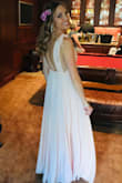 I got xs size and it fits perfectly! It's very long as they all are. I got many complements. It's perfect for dancing, very stunning, and still comfortable. - Kasia D.