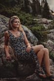 Very flattering, hides imperfections with the print. You can tie the sleeves up top or in the back. Flattering for your legs and waist when sitting. Lightweight but not see through at all. - Bethany S.