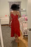 This dress is gorgeous and sexy while also not revealing too much. I'm smaller chested so the top could be a bit tighter but it still fits. I'm hourglass with a little more on bottom. - Christina U.