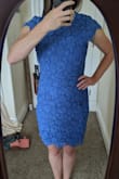 I ended up returning this in favor of a different dress, but the reason this dress lost was because it was a bit big. It was beautiful but the material is so thick that a looser fit meant that my waist sort of disappeared and the open back didn't feel super secure. I could pull the top of the back of the skirt several inches away from my body. I will admit I was looking for a tight fit, so if that's not for you, this dress could be fine in your standard size. - McKay S.