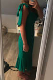 I love this dress, the length is perfect and it fits great. The only place it's tight is in the chest but I wouldn't size up. - Evie G.