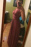 I got this for my friend's wedding. The bridesmaids are all wearing different dresses and I picked this one since there are so many different ways to wear it. I don't absolutely love it, but I gave four stars because it is so comfortable. It's impossible to wear a bra, but I was able to slide some inserts I had from a swimsuit to give some coverage. It is lined, but you can still see everything if it's even a little cold. You can tie it tight enough to hold the ladies up a little, but there's not much support. I tried tying it all the different ways and this was my favorite (see pic). It's a little short to wear with heels, so I'll be wearing flats. - Sarah D.