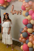 I wore this for my bridal shower that was fiesta themed. I got so many compliments. I was able to wear it without a bra, and I never can do that with any of my clothing. I was ordered the small and it fit great! - Alexis E.