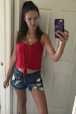 This top is cropped but goes nicely with high waisted shorts. Fits true to size. - Erin F.
