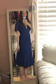 It fits perfectly and the dress is made of a very nice material. Plus, the length is very flattering. - Tess D.