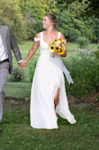 I bought this dress four days before my elopement and it was the perfect dress to make me feel elegant without spending too much! It was a little long, but nothing that taller heels couldn't fix! Plus, I didn't have time to get it altered! Beautiful and charming, yet the plunge and slit in the dress make you feel sexy! - Arica B.