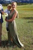 I wore this to a wedding 2 months after my daughter was born. Very forgiving for the tummy and the arms. I received many compliments. The color is gorgeous and was a good length with about a 2 inch heel. I traveled with it and it was very wrinkled but came out with a steamer. Wrinkled some after sitting on it. - Ashley B.