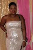 It dress is a statement piece by itself. It's a little heavy but I didn't mind at all. I fit my body perfectly. - Angelique H.