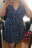 The quality of the dress is nice. The length was good, there was some support so that I didn't have to wear a bra. The only complaint I have is that the back opening is a bit wide and long. Definitely would be able to see any bra that's not taped in the front. I bought an XL and it fits nicely. - Antoinette K.
