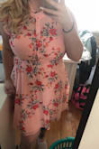This dress is adorable. I bought an XL and it fit amazingly. Will definitely be ordering the red. I also found that I don't have to wear a bra with this dress (I hate wearing bras) because it's super supportive. - Antoinette K.
