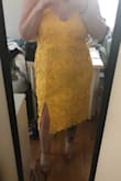 I love the design, the dress fits great, but it's a little long on me. I'm 5'4 and think this would look amazingly on taller gals. The dress is super high quality, thick and supportive (adjustable straps). Also, you can't wear colored underwear with this dress because you can see dark colors underneath (including my tattoos). - Antoinette K.