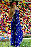 I ordered this dress for a summer wedding and I must say that it was a hit.
The fabric is of good quality and feels very comfortable, although a bit warm if you are wearing in the summer heat.
A couple things:
I'm tall (5'10) and ordered a Medium, with flat shoes this dress covers my feet. If you are you might need to consider alterations.
The open back is beautiful but it takes a few minutes to get dressed and find the right strings tie. - Chloe L.