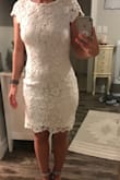 This dress is very cute! Form fitting and true to size. I was between S and M and glad went with S. I'm small in waist and bigger in hips and the dress was "stretchy" enough to go around hips. Not see through! - Jackie J.