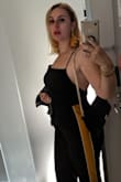 I have a short torso, so jumpsuits can be a struggle, but this fit perfectly. It was pretty easy to get on and off in the restroom because of the low-back and zipper. Love the adjustable straps to bring up the top on my short frame. Didn't need to hem when wearing with wedges. Easy to wear with a sticky bra. Not too hot in humid July nights in NYC. Got tons of compliments! - Angela K.