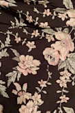 The dress is well made for the price point. It's comfortable and has adjustable straps (necessary for someone who is long from shoulders to waist). The bodice is lined. I'm 5'8" with a long torso, so the dress hits me just at the knees. It's not a midi-dress on me. My only issue with this dress is the fact that the print, in real life, is muted. The photo on the site has a much more color saturated print, whereas in real life the print is muted somehow - it looks a tad faded. So while the print on line is super cute, in real life it reads more as "grandma's couch." Don't get me wrong, I'll be KEEPING the dress because it's still wearable, just not for anything resembling a dressier occasion. Overall I am very happy with Lulus and their customer service so I will continue to shop with them. - Aileen Q.