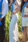 Absolutely adore this jumpsuit. I used it for grad photos and graduation day! I got tons of compliments and didn't have to worry about any wardrobe malfunctions since the top was tight enough that my boobs were secured. However, to all my vertically challenged friends, you will have to get this hemmed or use copious amounts of fabric tape. It's a thick material so no underwear was showing through! If you want something different from the traditional plain white dress, this is your answer. - Arabella F.
