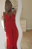 This was for my engagement party and I was feeling myself with this hot red sexy romper. Obsessed! - Chelsea M.