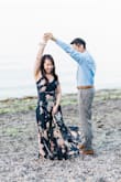 I was in search for a long flowy dress for my engagement session on the beach. I had my eye on this dress for a long time but didn't order it because I was afraid that it would need some hemming. After many trips to the mall and returning items that didn't fit, I decided to order it. Best decision ever!! At 4'11" I didn't need to tailor this dress at all and the length was perfect with heels. - Carolyn L.