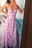 I bought this dress from Lulus for a formal event and absolutely adored it as soon as it arrived. It fitted me great, and had adjustable straps and lace up back which can be tightened to hug your waist more. The colour was beautifully amazing and I loved the pink floral, which I thought was unique to the dress. However, as much as I love this dress it was slightly too long, so I had to get it taken up and altered quite a fair bit. Shipping was extremely pricey as well, due to myself living overseas the prices were not converted according to where I live. - Jacqui L.