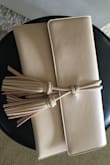 Got this clutch to take to a wedding and it was perfect! A little bit bigger than I anticipated but I wouldn't change that. Can fit essentials and is so stylish! - Claire I.
