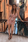 I wore this romper for a day out in Venice and at a Bachelorette party; with the heat it can get a little wrinkly but in general I LOVE it! It is a little short if that's a concern but perfect for a hot weather day. It did shrink a little even washing it cold and hang drying. - Roxy B.