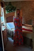 I absolutely love this dress! The fabric is so light and flowy that you almost don't know that you are wearing something. Very comfy. The only thing is that the sleeves are a bit tight but not too bad. - Alyona M.