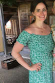I am 10 weeks post-partum and this dress fit perfectly. I wore a medium before I was pregnant and ordered a medium in this dress and was pleasantly surprised how well it fit! - Allison R.