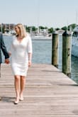 Wore for my elopement, the fabric is thick so wearing in July was a little warm & it did start to wrinkle. Pretty low cut but very flattering. Would be great for any bridal event. - Liz H.