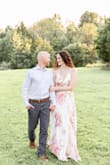 This dress is beautiful! Just slightly tight on the chest, but not too bad. It was perfect for our engagement photo shoot. - Lauren S.