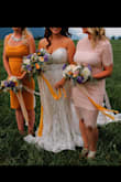 I wanted my bridesmaids to "go" but not be "matchy matchy".  I also wanted each girls style to be true to her personal style.  Searched HIGH and LOW to find the perfect option and this was it!  My bridesmaid and I have different style and this dress perfectly mixed a bit of skin and sex appeal but in an understated and conservative way.  She was comfortable and felt great all day!  She had a hard time finding underwear/spanks but otherwise it was perfection.  How gorgeous were my bridesmaids!?

(For some reason the photos got a bit darker when I uploaded them, but the dress was a nice light blush pink, color is true to website photos) - Alexandra F.