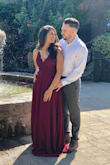 I wore this dress for my engagement photos! The color is beautiful! The dress material is heavier than I thought (not a bad thing). The length is definitely longer than I had realized. I wore it with sandals so I did have to lift the dress slightly when walking so it wouldn't get too dirty. I am a size small and the fit was a tiny bit big. I probably could have gotten away with an XS. - Nitasha P.