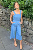 This was the easiest outfit I ever assembled! The romper was super cute, comfortable and chic. Totally effortless look for our pre-wedding dinner. The chambray material is light but strong and surprisingly forgiving. I originally ordered a Small but returned it for the XS due to my smaller hip size. The top portion is much more adjustable so if between sizes I'd choose based on your hip measurements. - Mele H.