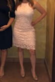 I tried on this dress as soon as it arrived and my husband who never has an opinion about anything I buy, could not stop talking about it. He absolutely loved it. Very beautiful, and perfect for the banquet hall baby shower I attended. 

My only complaint was the dress had a strong odor that smelled like crayons. I know it sounds weird but that's exactly what it smelled like. 

I normally wouldn't complain about something like that but It was so strong that I had to ask for an exchange. Customer Service was amazing though. They were very courteous and shipped me a replacement overnight so that I would have it in time for my event. 

The only thing Is I believe the odor comes from the fabric of the dress because the replacement had the same exact smell. I had to wash a couple times and dry with scented dryer sheets to remove the odor. (Washed and dried on the gentle cycle.) By the way the lighting in the picture wasn't too great, but the color is beautiful. It was the same color shown online. - Xiomara J.