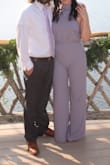 I wore this jumpsuit to a friends wedding. I'm usually a small in Lulus, but I could have also been comfortable in a medium for this particular jumpsuit. I loved the lavender color, and thought it was a classic choice. You cannot wear a bra with it, but fashion tape worked just fine. I buy all my dresses from Lulus, because I have yet to be disappointed. Great quality, and always lots to choose from! - Ashleigh T.