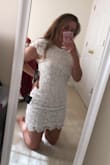 The dress seems like it's made from a good fabric, I'm just afraid of moving it too much. It's a little tight on me and I thought it'd be super long on me as described by other women on here but if you have some booty, it'll hike up the dress which I didn't mind! There is a button on top that connects the top of the sleeves in the back and there is a dress closure as well as a white zipper so it's secure for moving and wiggling! Also I'd be in your best interest to wear gray or nude-colored panties, the underlay is a little see through but not too much! - Leanne J.