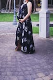 Ordered a size up and wore to a wedding while 38 weeks pregnant. The high lo part was flowy enough to cover my very pregnant belly. - Natalie T.