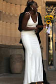 My wedding was last week. It was a very small intimate get together, so I wanted a dress that looked the part. This dress was an easy, cost effective way to look like a young summer bride, and checked all the boxes fit wise. Decent support without a bra, beautiful waist and hip hugging fit, and an effortless flare at the bottom. My husband (omg I have a husband) adored me in it, and I can't wait to pass it on, because I know the excellent quality and timeless sleek design will age well. - Karisa C.