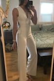 I had been eyeing this jumpsuit for a while, then I decided to order it for my rehearsal dinner. It was very cute and flattering, but the torso area was definitely not long enough for me and it was not possible to wear the jumpsuit. Besides the I'll fitting crotch/butt length on my 5'9 body, it fit nicely! I had to return it. - Kristen L.