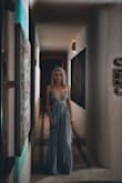 This dress... is sexy! Fits great, super long, and low cut! - Georgeta S.