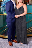 This dress is so beautiful. The fabric looks like the night sky and has a great texture. It is a true wrap dress so I think it will look great on any figure. - Alexa
