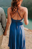 This dress is so nice! Very flowy and beautiful. I have worn in on many dates as well as my thesis presentation and my engagement photoshoot. The tie in the back is connected to the straps so it can get tight - I just tied wee knots where it goes through the first eyelette so that it doesn't pull or fall down in the front. - Haley R.